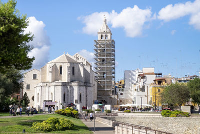 View of buildings in city against sky