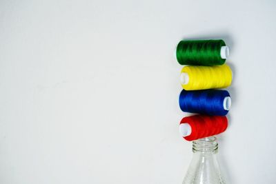 High angle view of bottle against white background