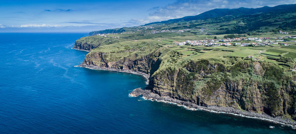 Panoramic view of sea and mountains against sky azores