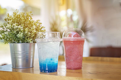 Close-up of drink on glass table