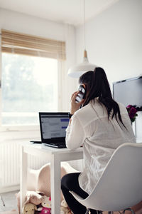 Woman using cell phone