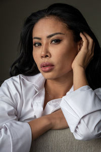 Portrait of young woman looking away