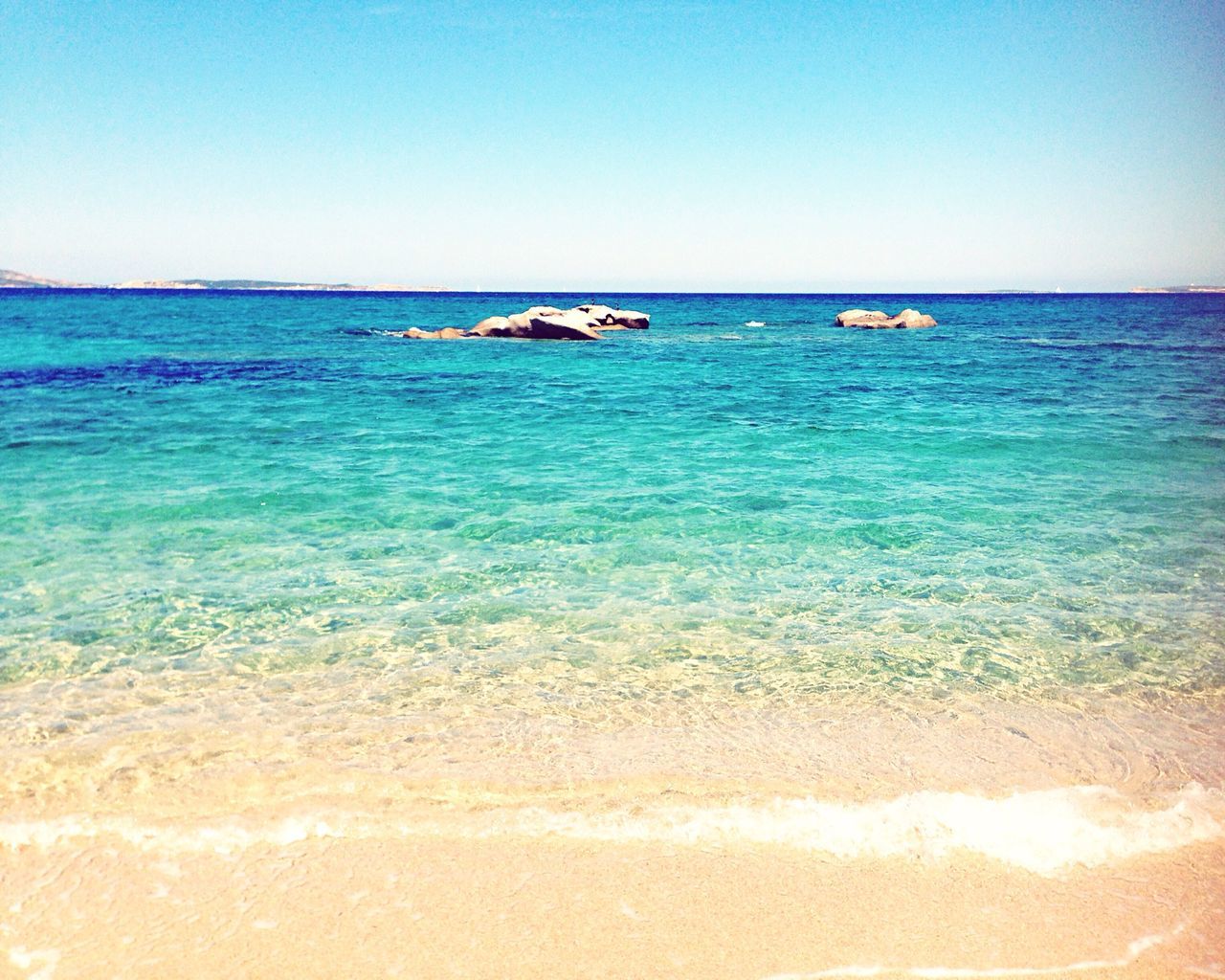 sea, water, horizon over water, clear sky, beach, copy space, tranquil scene, scenics, blue, tranquility, beauty in nature, shore, nature, nautical vessel, wave, seascape, idyllic, rippled, boat, sand