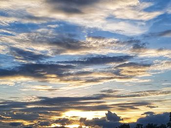 Low angle view of clouds in sky during sunset