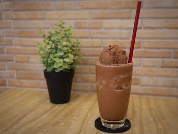 Close-up of ice cream in glass on table