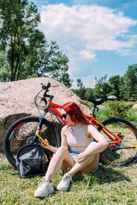 Young attractive woman is resting after bicycle ride. active lifestyle, sports