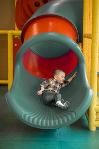 Cute girl playing in kitchen