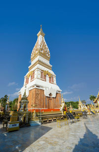 View of temple building against blue sky