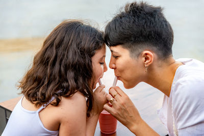 Young couple kissing outdoors