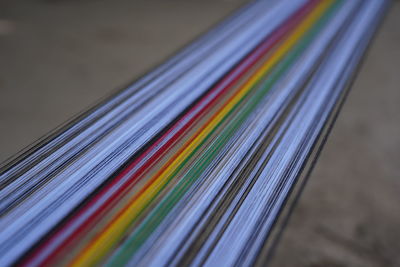 Close-up of multi colored pencils on table