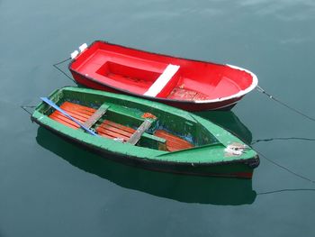 High angle view of boat moored in water