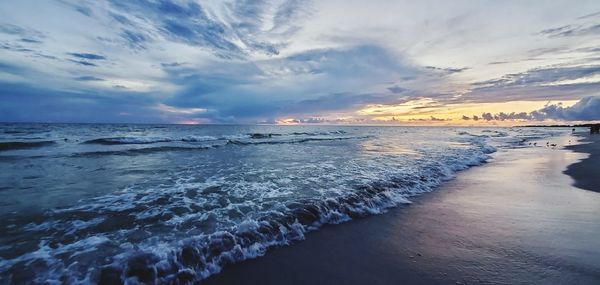 Scenic view of sea against sky during sunset