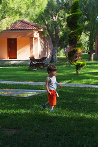 Full length of boy in yard