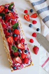 High angle view of strawberries on cake