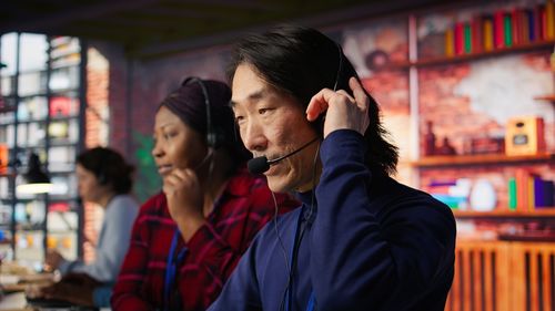 Side view of young woman looking away