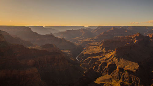 Scenic view of mountains against sky during sunset