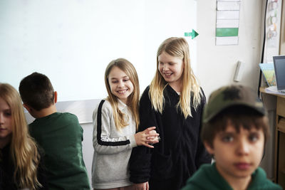 Smiling students in classroom