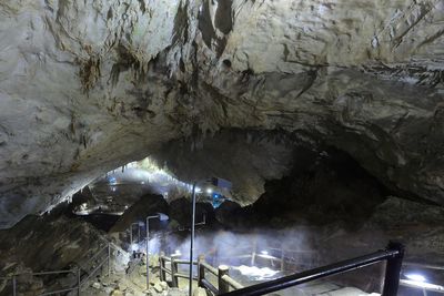 Panoramic view of illuminated tunnel