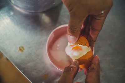 High angle view of person preparing food