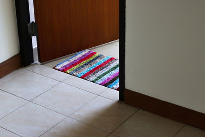 High angle view of multi colored tiled floor at home