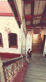 Man standing in corridor