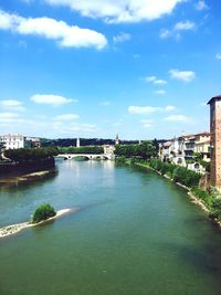 View of bridge over river in city