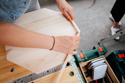 High angle view of man working on table