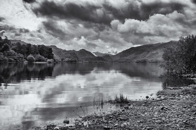 View of lake against cloudy sky