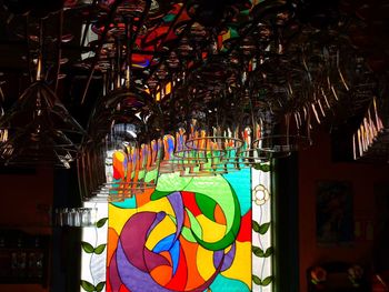 Close-up of illuminated lanterns hanging at night
