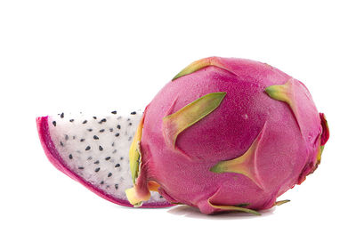 Close-up of fresh fruit against white background