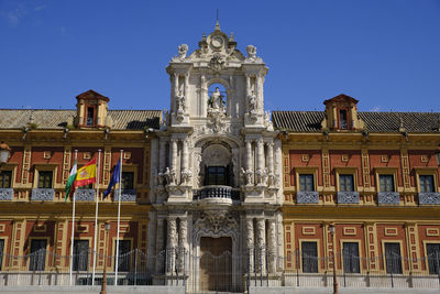 Low angle view of building against blue sky