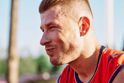 Close-up of young man looking away