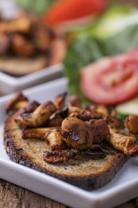 Close-up of meat in plate on table