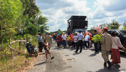 People on road against sky