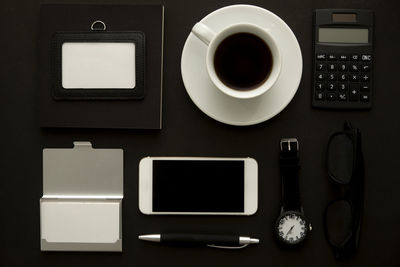 High angle view of coffee cup on table