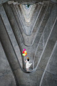 High angle view of man holding umbrella