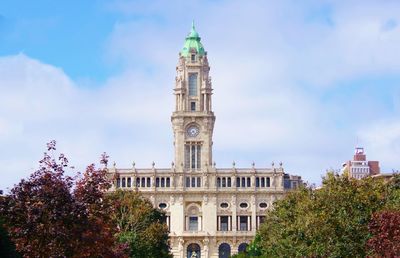 View of clock tower against cloudy sky