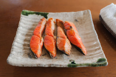 Close-up of sushi on cutting board