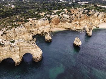 High angle view of rock formation in sea