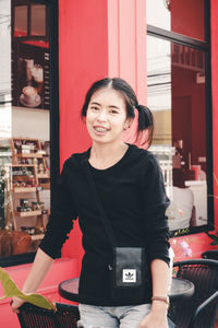 Portrait of a smiling young woman