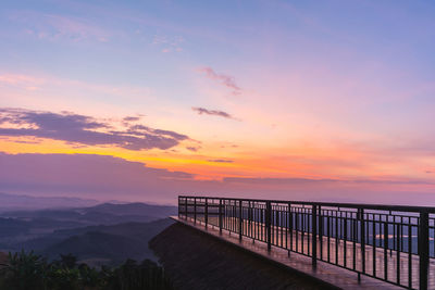 Scenic view of sea against orange sky