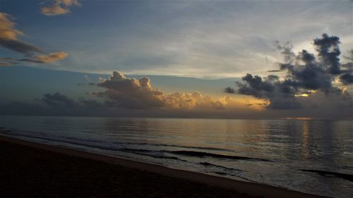 Scenic view of sea against sky at sunset