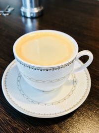 Close-up of coffee cup on table