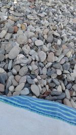 High angle view of stones on beach