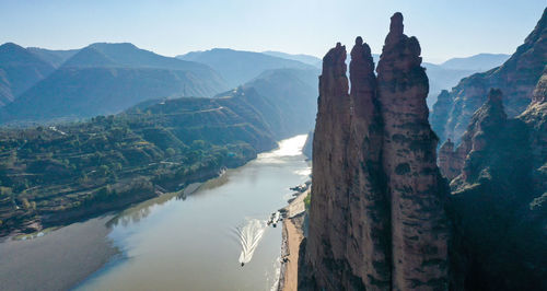 Panoramic view of mountain range against sky