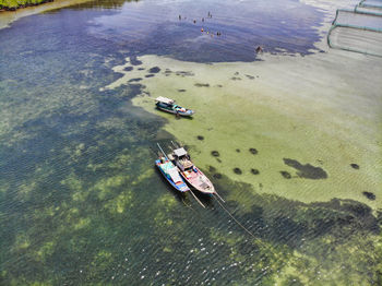 High angle view of boat moored on sea