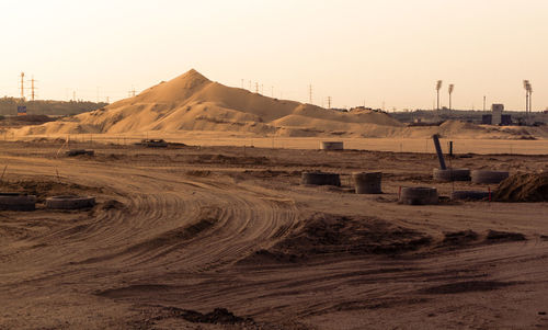 Scenic view of desert against clear sky