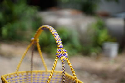 Close-up of multi colored rope in park