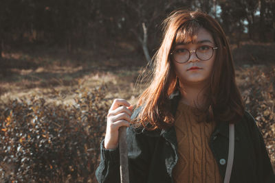 Portrait of young woman wearing mask