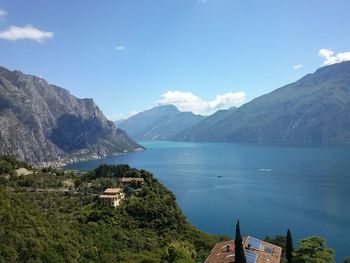 Scenic view of lake against cloudy sky